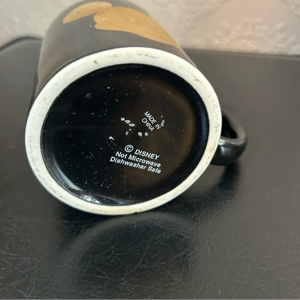 Disney Mickey mug gold black great condition approximately 3.75” high